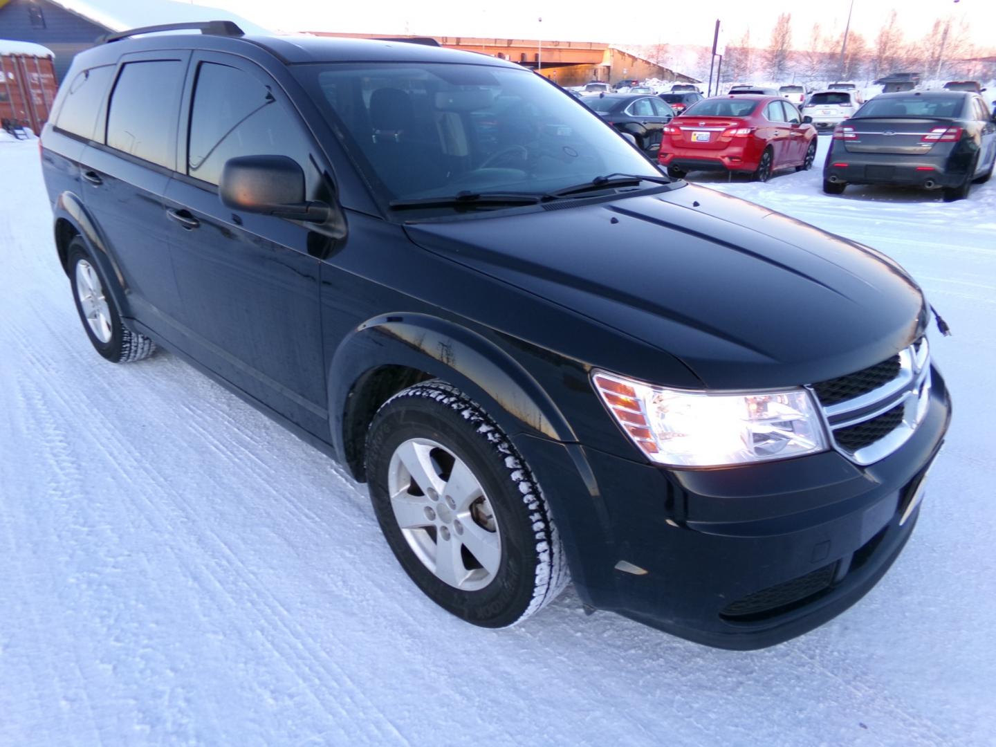 2017 Black Dodge Journey SE (3C4PDCAB0HT) with an 2.4L L4 DOHC 16V engine, 4A transmission, located at 2630 Philips Field Rd., Fairbanks, AK, 99709, (907) 458-0593, 64.848068, -147.780609 - Photo#0